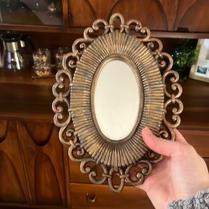 Small gold mirror